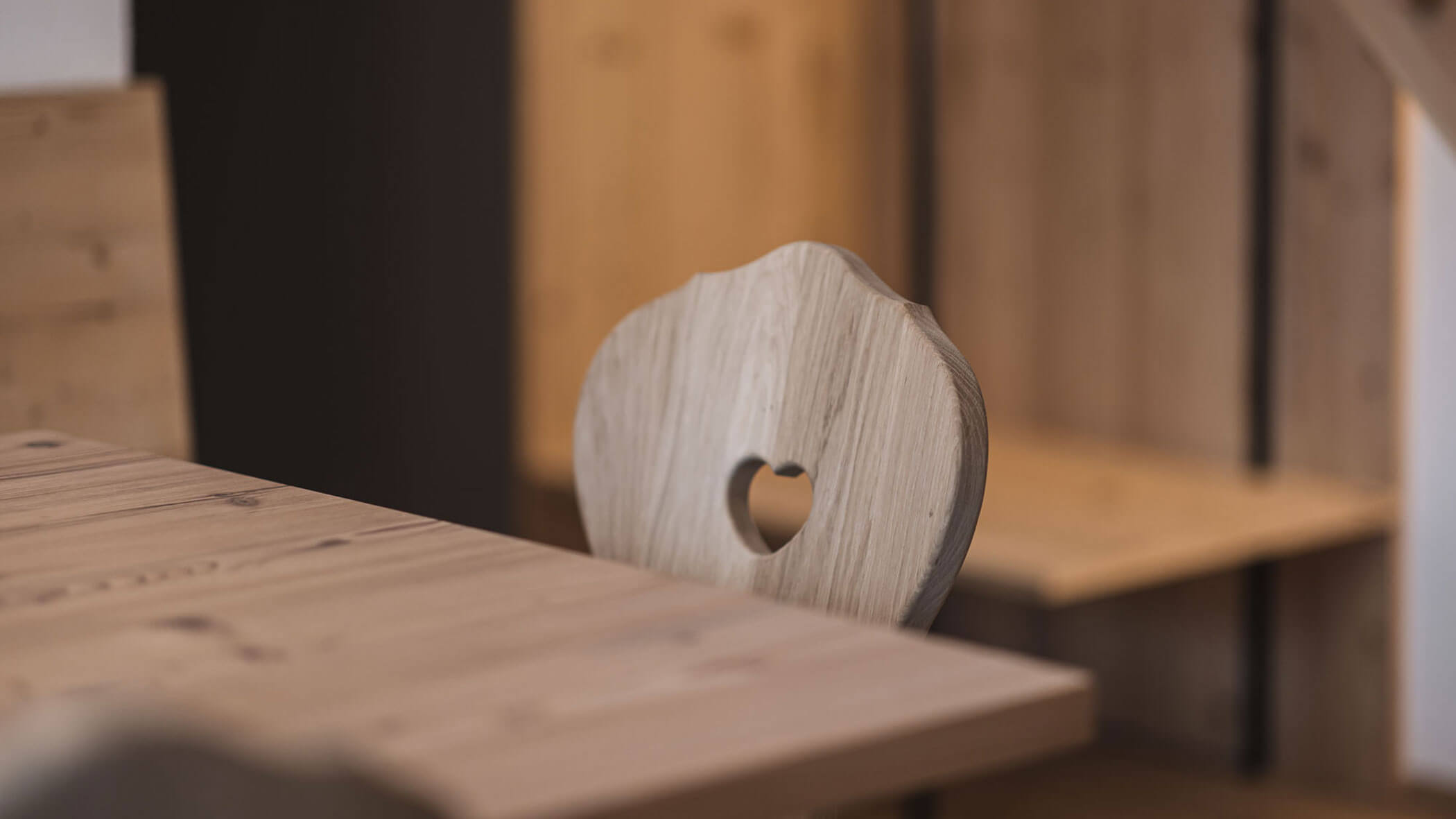 Holiday apartment - detail of wooden chair - Obermairhof in Valdaora
